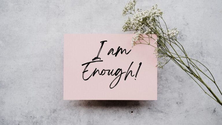sign that says I am enough -how to rebuild self confidence