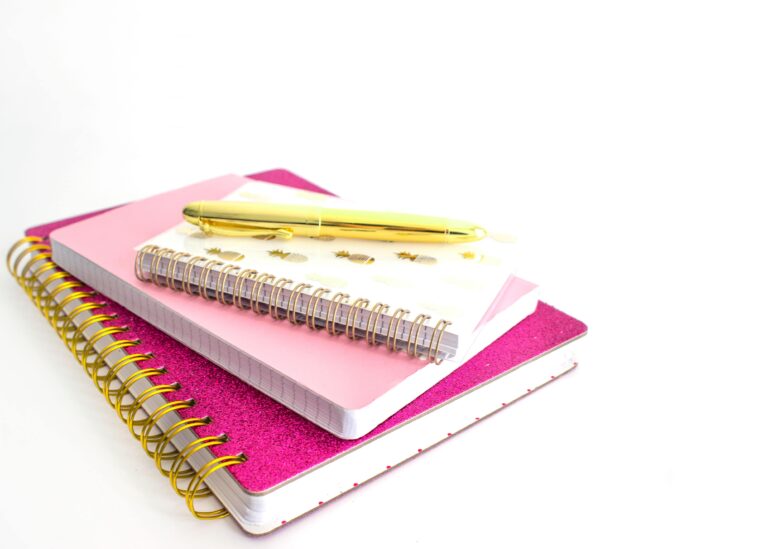 notebooks and pens to use with your self love journal prompts